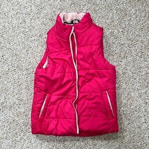 Amazon essentials pink vest with zipper pockets size medium.